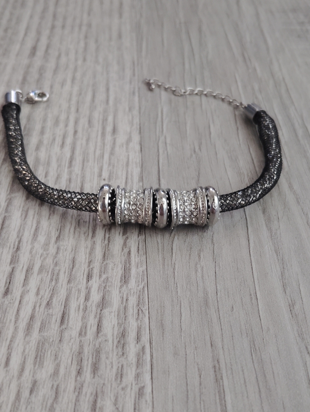 Sparkling Crystal Accent Black Mesh Bracelet with Silver Rings